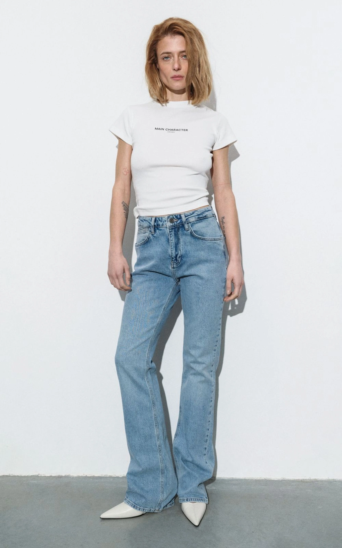 MAIN CHARACTER Fitted T-Shirt