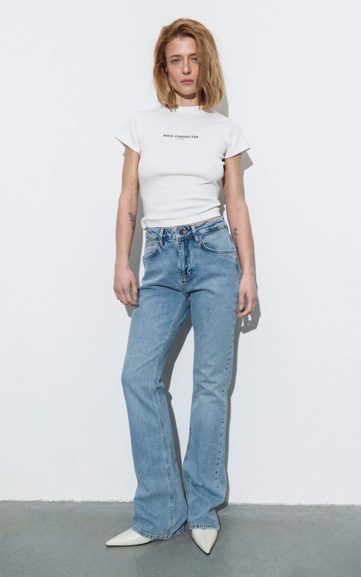 MAIN CHARACTER Fitted T-Shirt